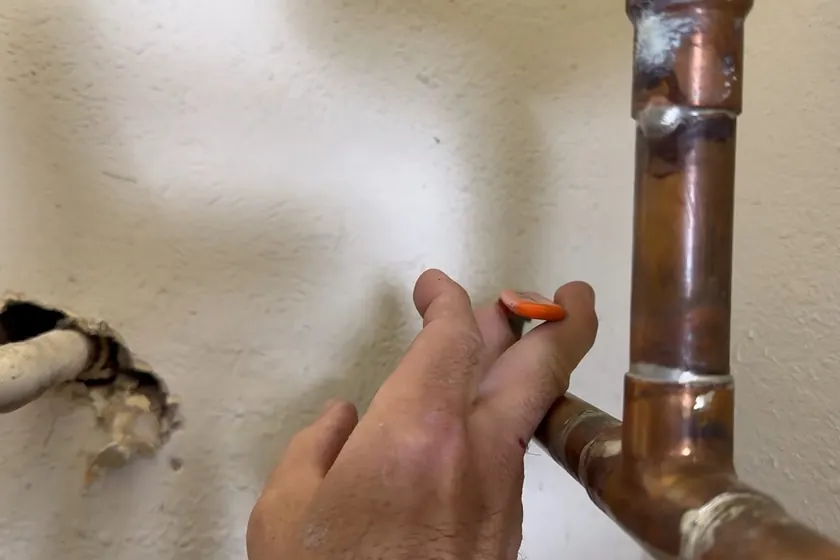 A water heater tank, valve, or supply connection is inspected during service near Cerritos, CA on Water Heater Sediment in Cerritos: What Hard Water Does to Your Tank blog b7 002