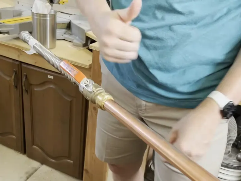 A water heater tank, valve, or supply connection is inspected during service near Cerritos, CA on Water Heater Sediment in Cerritos: What Hard Water Does to Your Tank